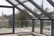 Ogród zimowy. Ściany boczne. Szklane panele montowane na ramie ze stali ocynkowanej, malowanej proszkowo, wykonanej z rury kwadratowej